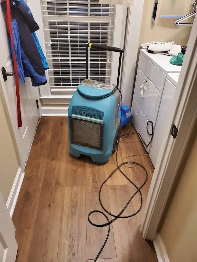 Commercial dehumidifier deployed for Flood Damage Cleanup in Manorhaven